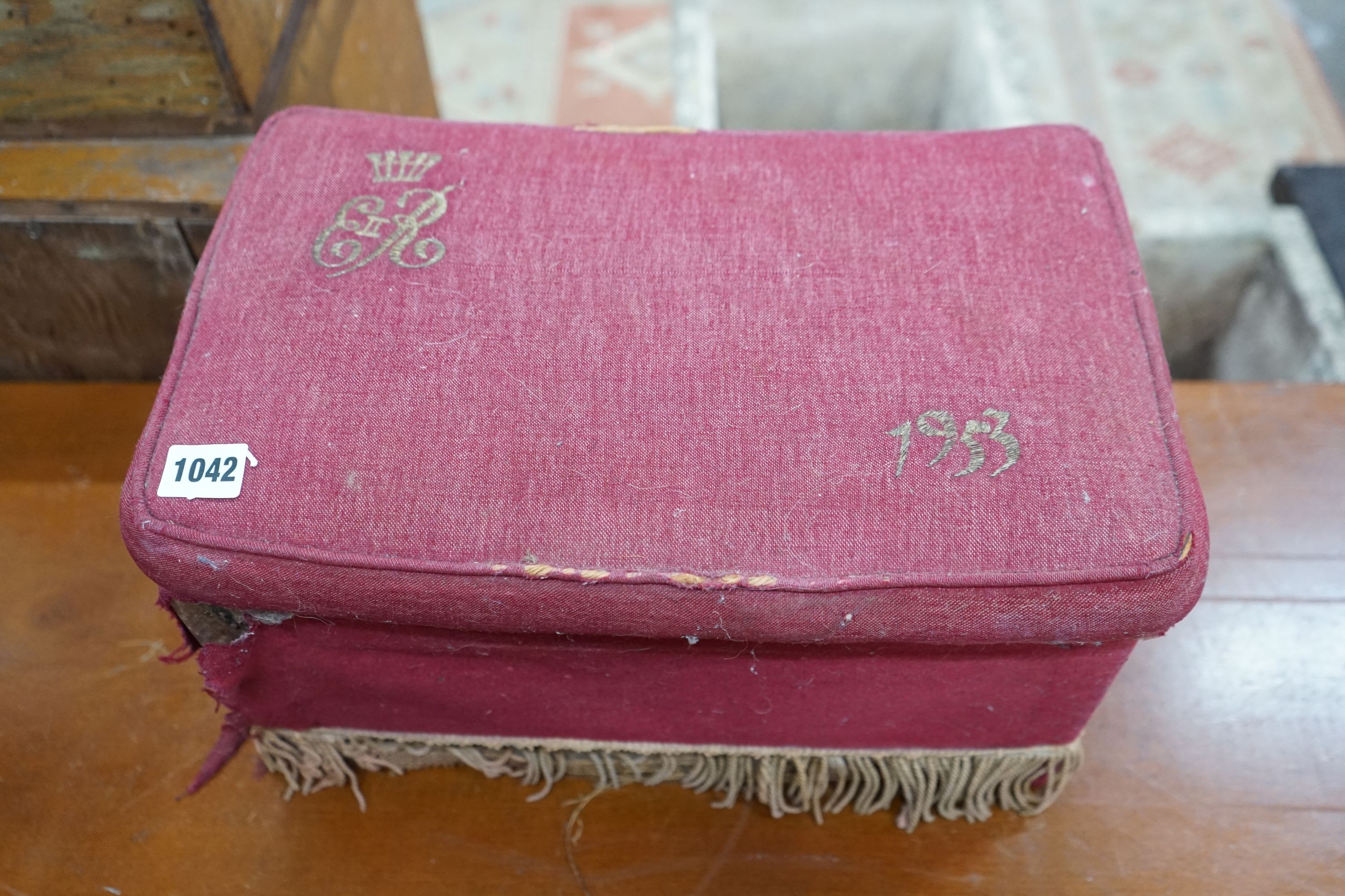 An Elizabeth II rectangular upholstered coronation footstool, width 42cm, depth 26cm, height 24cm